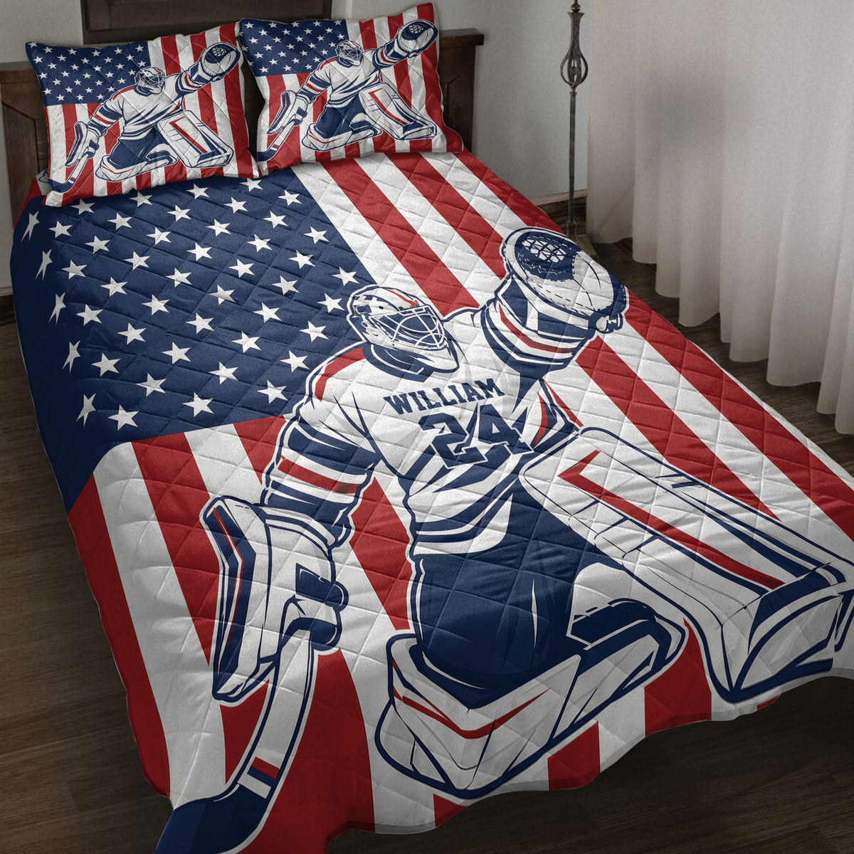 Hockey quilt bedding set displayed on a bed with goalie artwork and patriotic red, white, and blue stars and stripes