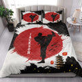 Karate quilt blanket styled in a bright bedroom with bold red and black martial arts artwork