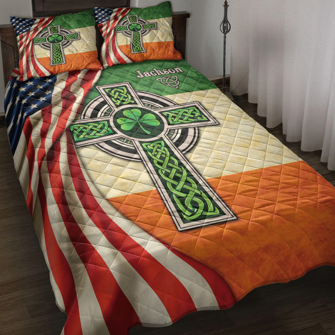 Irish quilt blanket displayed on a bed with Celtic cross artwork, shamrock motifs, and Irish-American colors