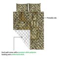 Camouflage veteran quilt showing the printed side and white quilted reverse backing