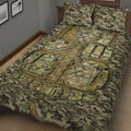 Close bedroom view of camouflage quilt bedding with detailed tactical vest design