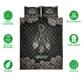 American Native dreamcatcher quilt bedding set displayed with dark stone borders and feather artwork