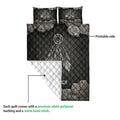 American Native quilt showing a printable dreamcatcher and feather design with contrasting white backing