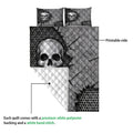 Skull quilt blanket showing the printed front and white quilted backing in a product detail view