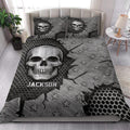Gothic skull quilt bedding styled on a bed in a bright bedroom with matching skull pillow designs