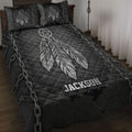 Dark Native American quilt blanket featuring a large feathered dreamcatcher, chains, stars, and textured black artwork