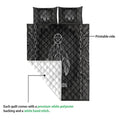 Native American feather dreamcatcher quilt showing the printed front and white quilted backing