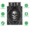 Skull quilt bedding set shown flat with chain details, dark artwork, and care feature icons