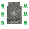 Hunting quilt bedding set shown flat with antler artwork, woodland textures, and gray diamond quilting
