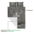 Hunting quilt showing a printed antler design, white reverse side, and quilt construction detail
