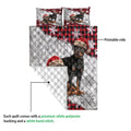 Rottweiler quilt blanket showing the printed front and white quilted backing