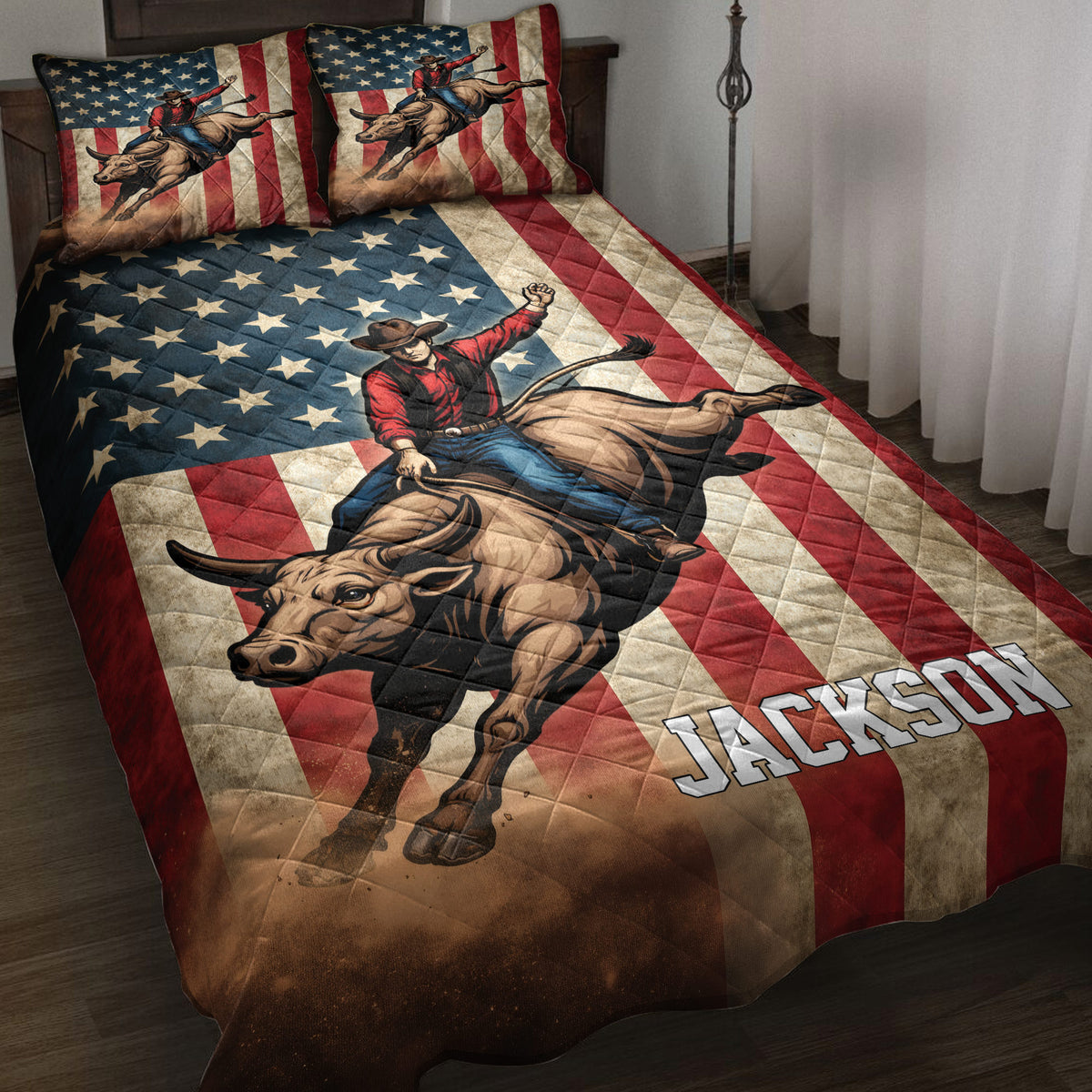 Rodeo bull riding quilt blanket displayed on a bed with patriotic stars and stripes artwork