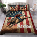Rodeo bull rider quilt blanket styled across a bedroom with bold western artwork