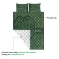 Irish shamrock quilt blanket showing the printed front and white diamond-stitched reverse