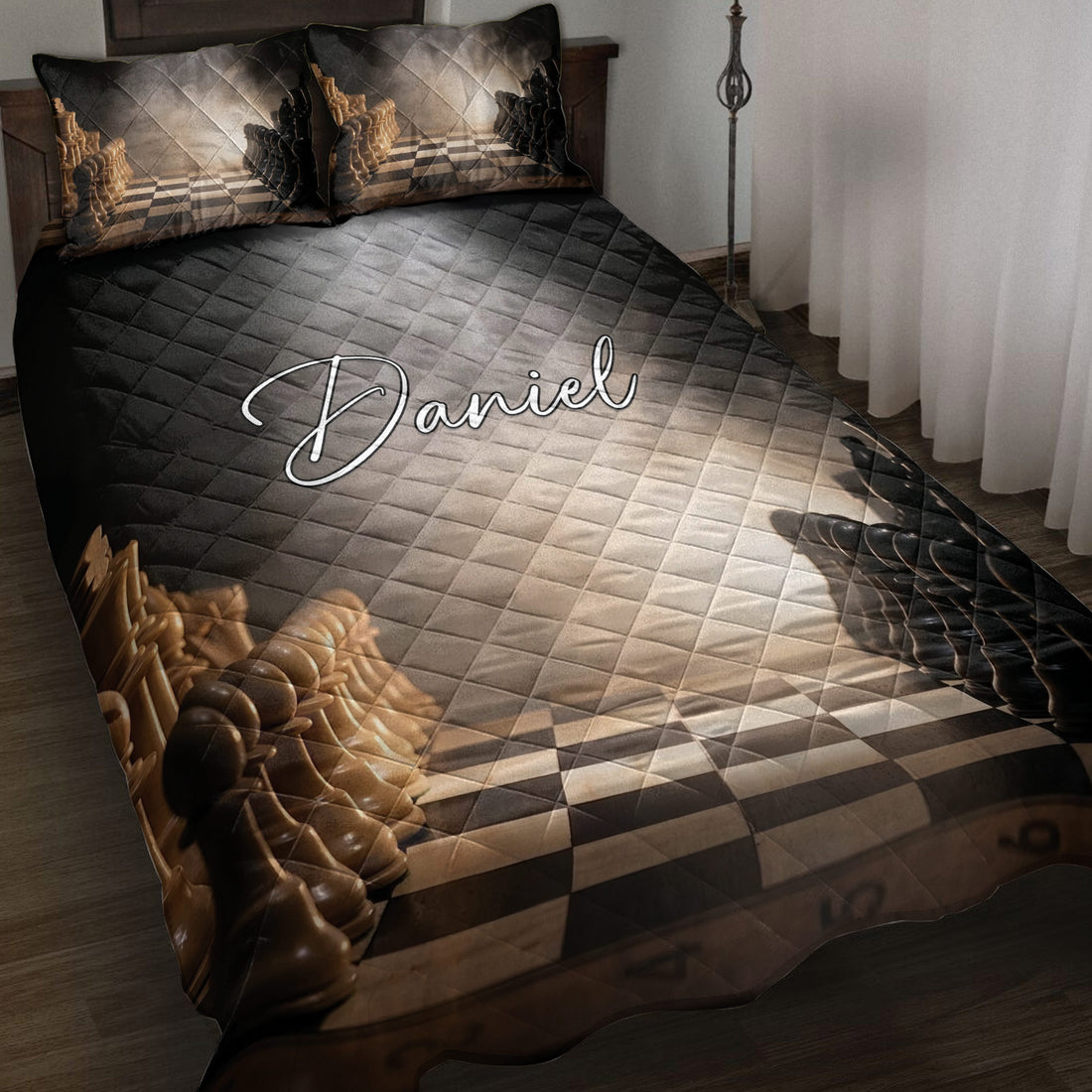 Chess quilt blanket styled on a bed with black and gold chess pieces and a dramatic checkerboard design
