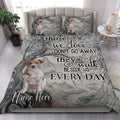 Jack Russell dog quilt blanket styled in a bright bedroom with matching dog artwork on the bed