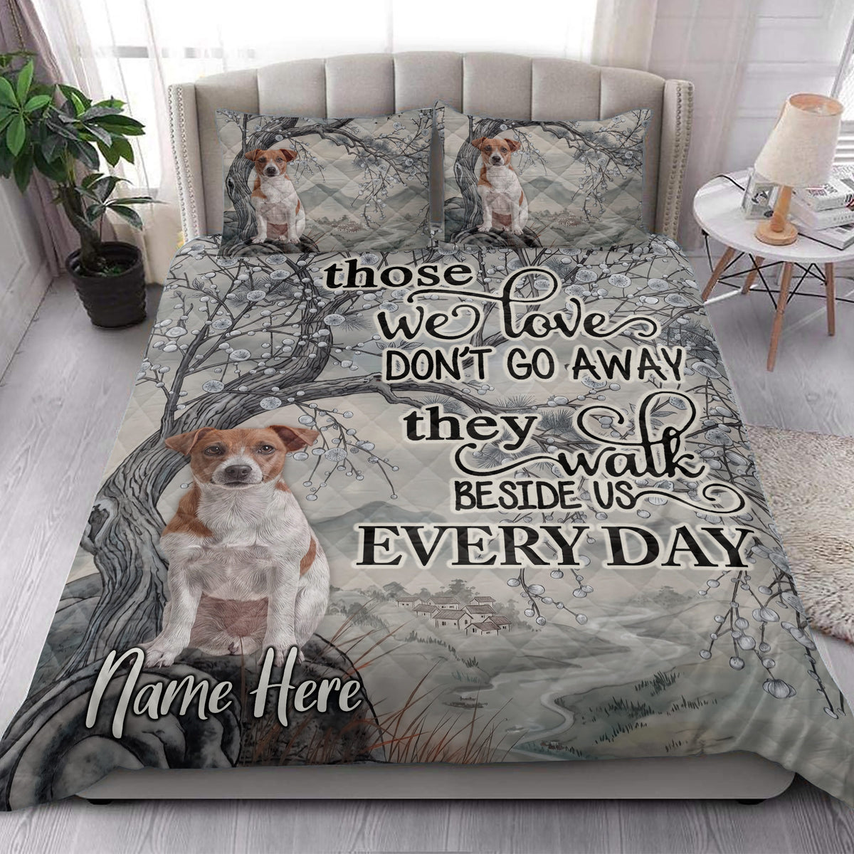 Jack Russell dog quilt blanket styled in a bright bedroom with matching dog artwork on the bed