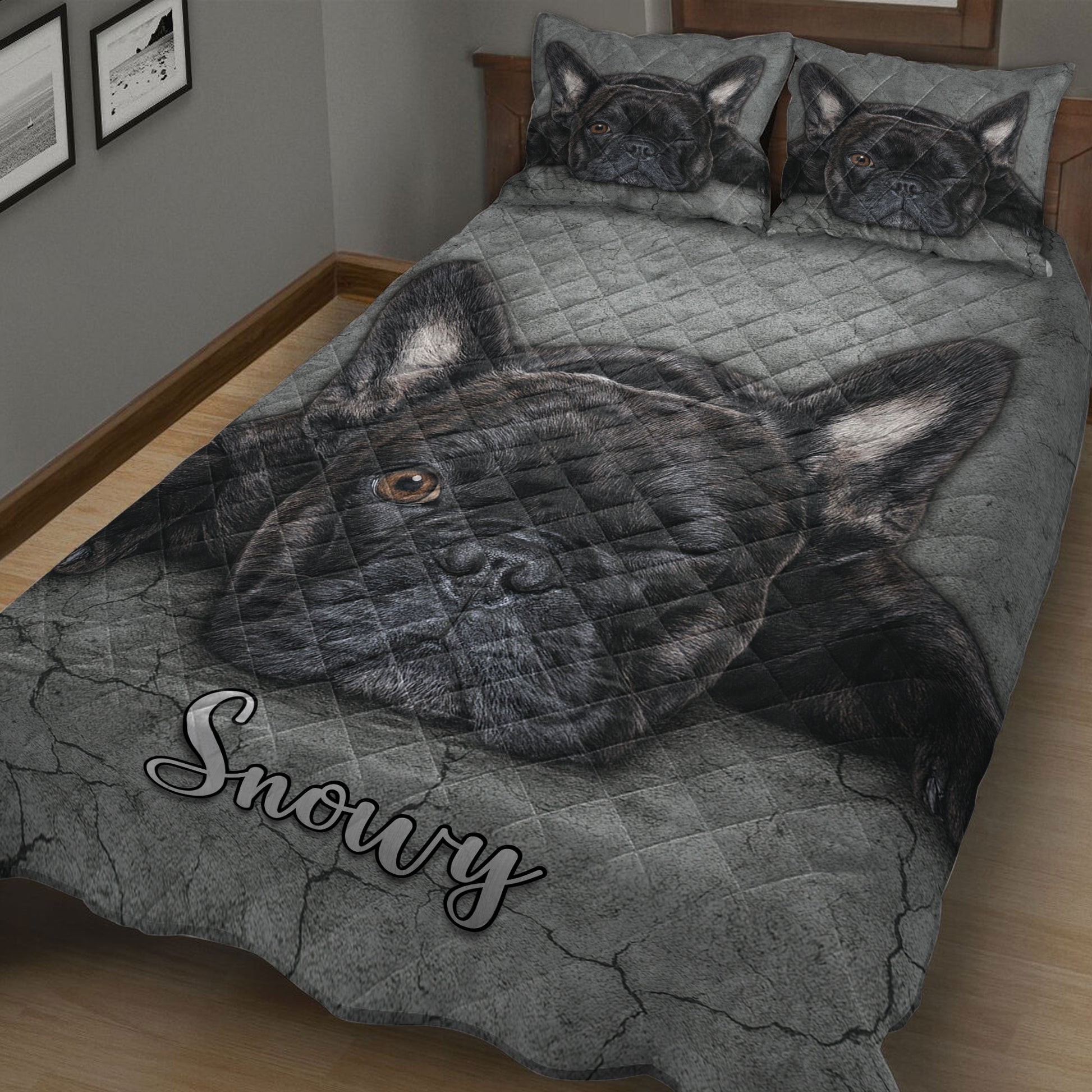 Gray French Bulldog quilt blanket displayed on a wooden bed with black Frenchie portraits and textured artwork