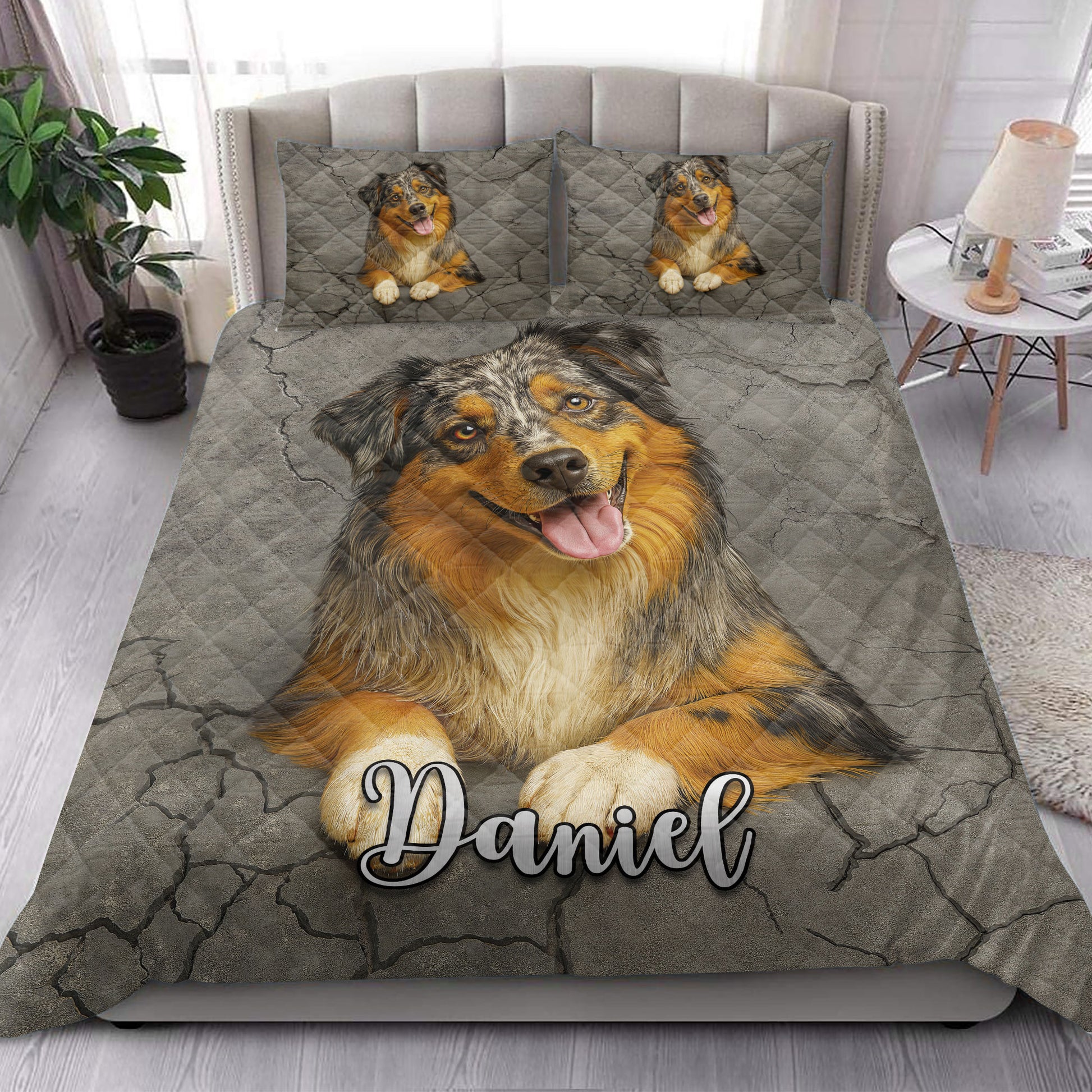 Australian Shepherd quilt blanket styled in a bright bedroom with coordinated dog artwork