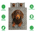 Dachshund quilt bedding set shown front-facing with matching dog pillow artwork and gray diamond background