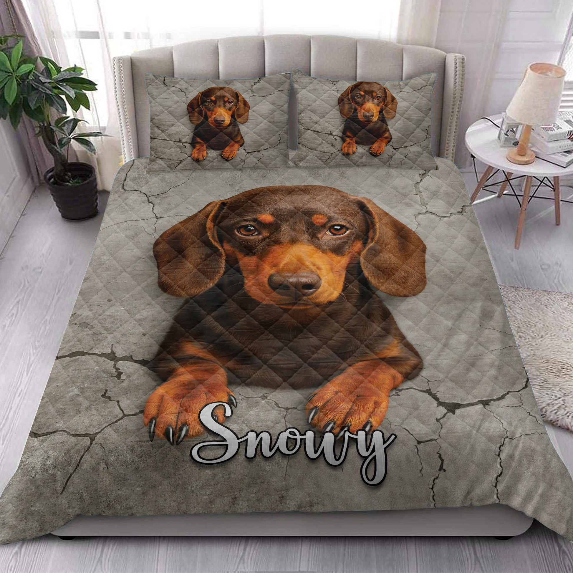 Dachshund quilt bedding set styled in a bright bedroom with a large brown dog portrait across the bed