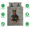 Doberman quilt bedding set displayed with matching dog artwork and feature icons