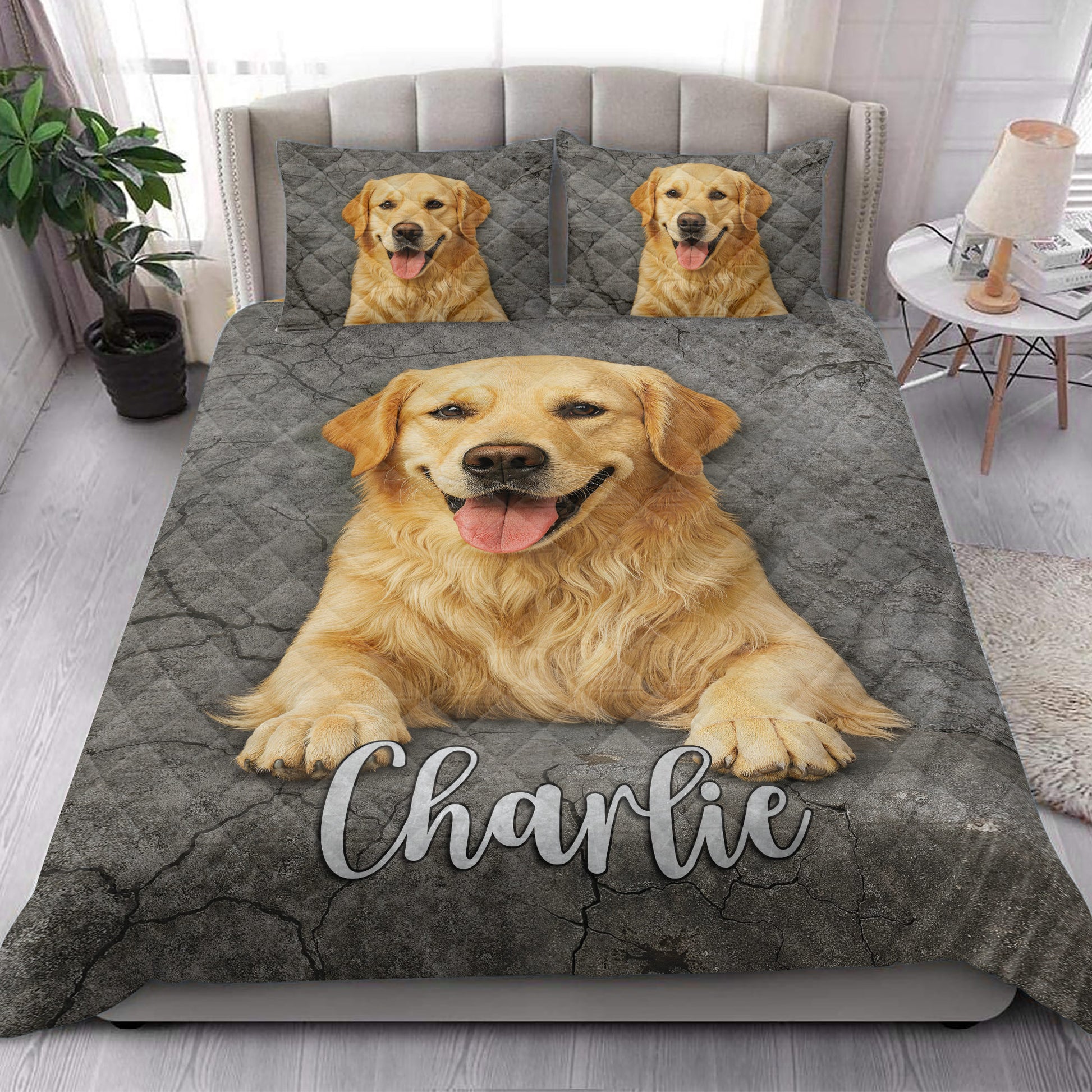 Golden Retriever quilt bedding set styled in a bright bedroom with a large dog portrait across the bed