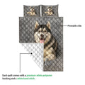 Husky quilt showing the printed front and white quilted backing with matching pillow designs