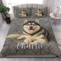 Husky quilt bedding styled in a bright bedroom with a large dog portrait and gray stone background