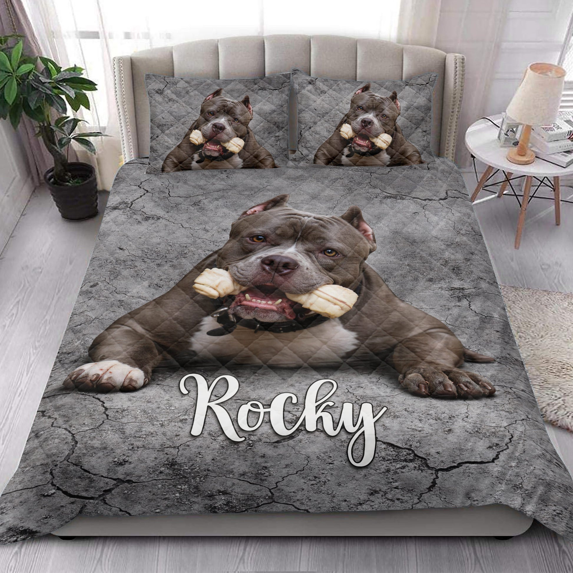 Pitbull quilt bedding set styled in a bright bedroom with a large realistic dog portrait