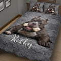 Close bedroom view of a pitbull quilt blanket featuring a realistic dog portrait and gray stone texture