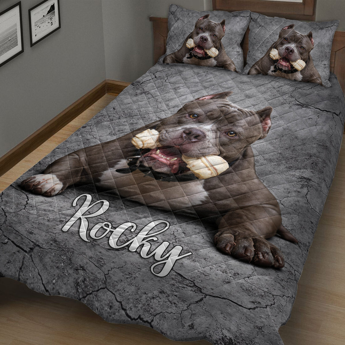 Close bedroom view of a pitbull quilt blanket featuring a realistic dog portrait and gray stone texture