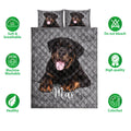 Rottweiler quilt bedding set shown with dog portrait artwork and product feature icons
