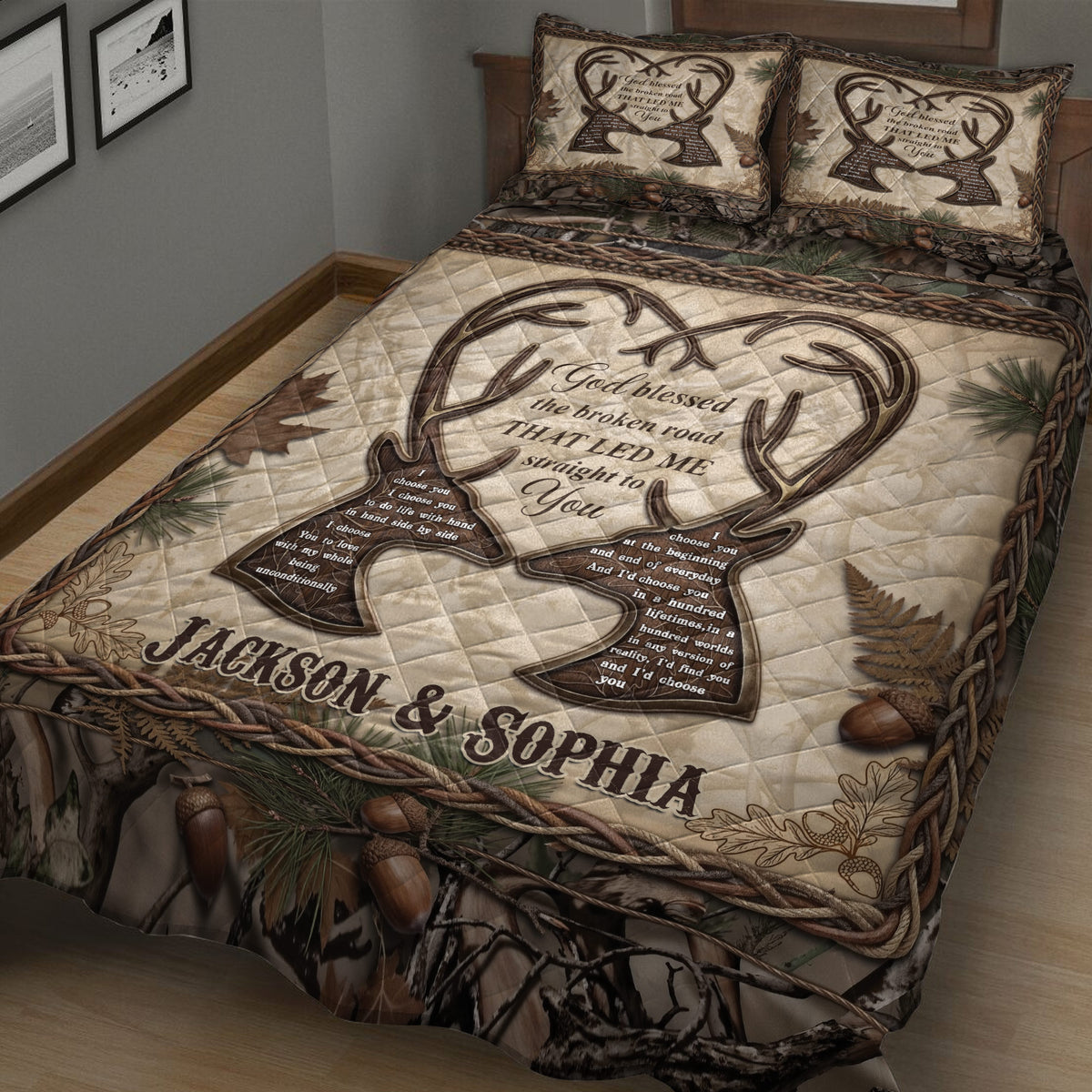 Close bedroom view of a hunting quilt blanket with antler artwork, forest camouflage, oak leaves, and pine details