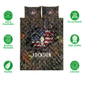 Hunting quilt bedding set shown flat with deer skull artwork, forest camouflage, and patriotic red, white, and blue details