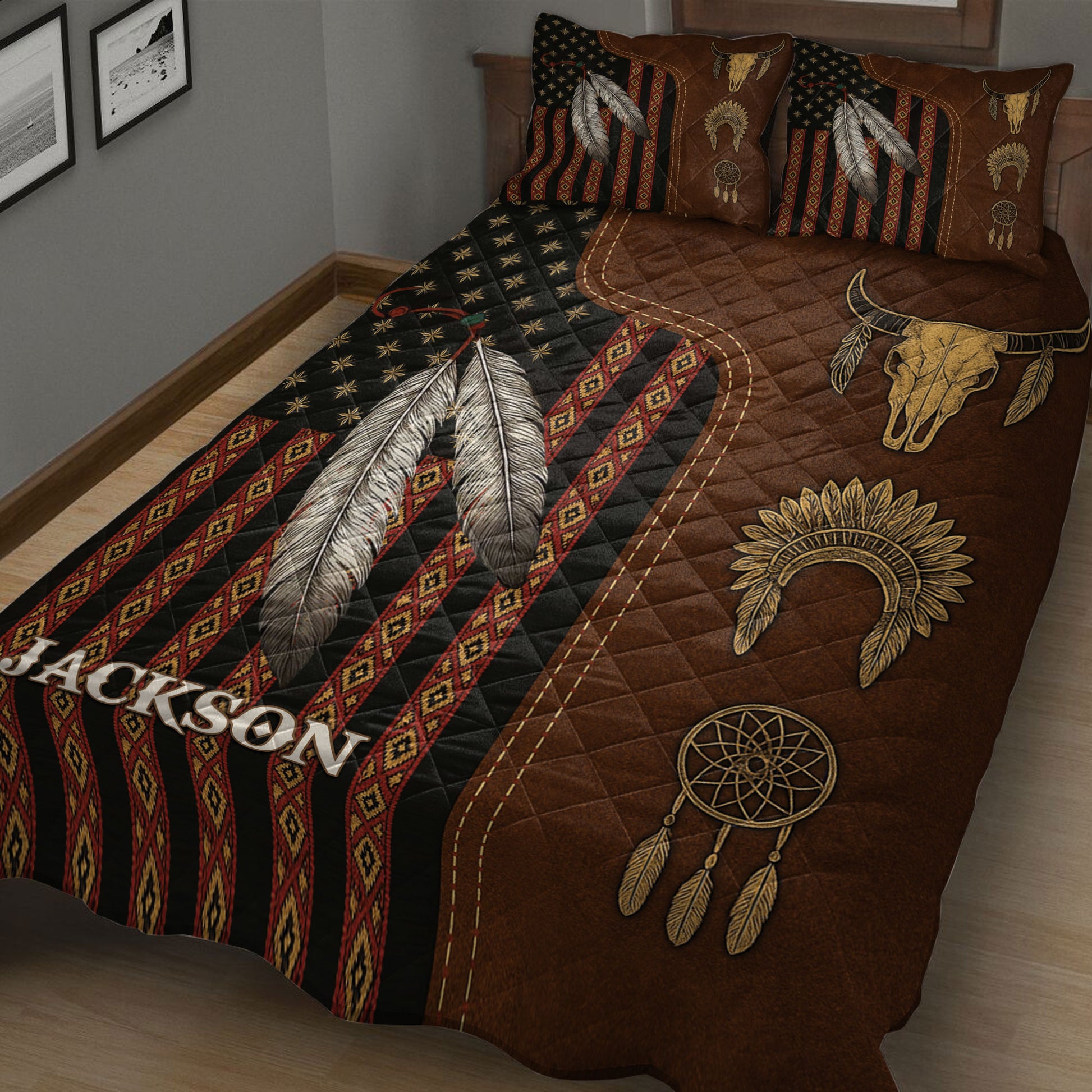 Close view of American Native quilt bedding with white feathers, red geometric bands, dreamcatchers, and bison skulls