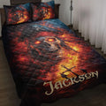 Pirate quilt blanket displayed on a bed with fiery skull artwork, crossed bones, anchor details, and matching pillows