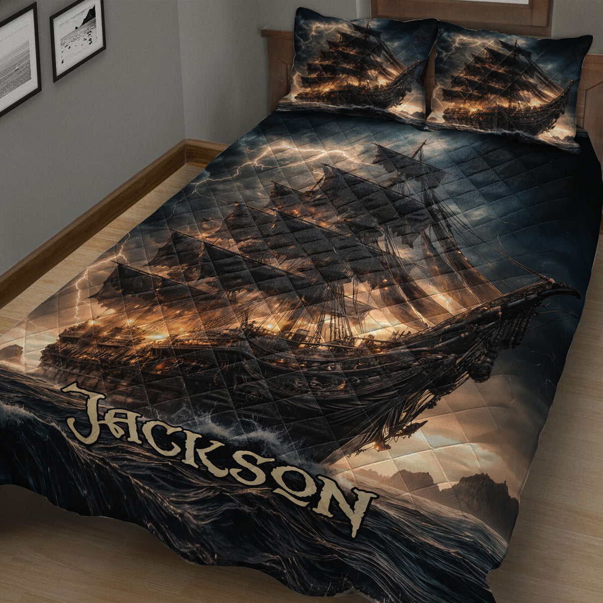 Close bedroom view of a pirate ship quilt blanket with lightning, rough seas, and cinematic nautical artwork