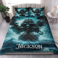 Pirate quilt bedding styled on a bedroom bed with dramatic skull ship artwork in teal and black tones