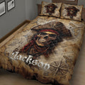 Pirate bedroom quilt featuring a large skull captain, vintage treasure map, sailing ship, and compass rose artwork