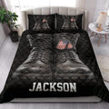 Military veteran quilt bedding styled on a bed with oversized combat boot artwork