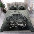 Boxing gloves quilt blanket displayed across a modern bed in a bright bedroom