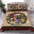 Christmas German Shepherd quilt bedding styled in a bright bedroom with festive wreath artwork and plaid trim