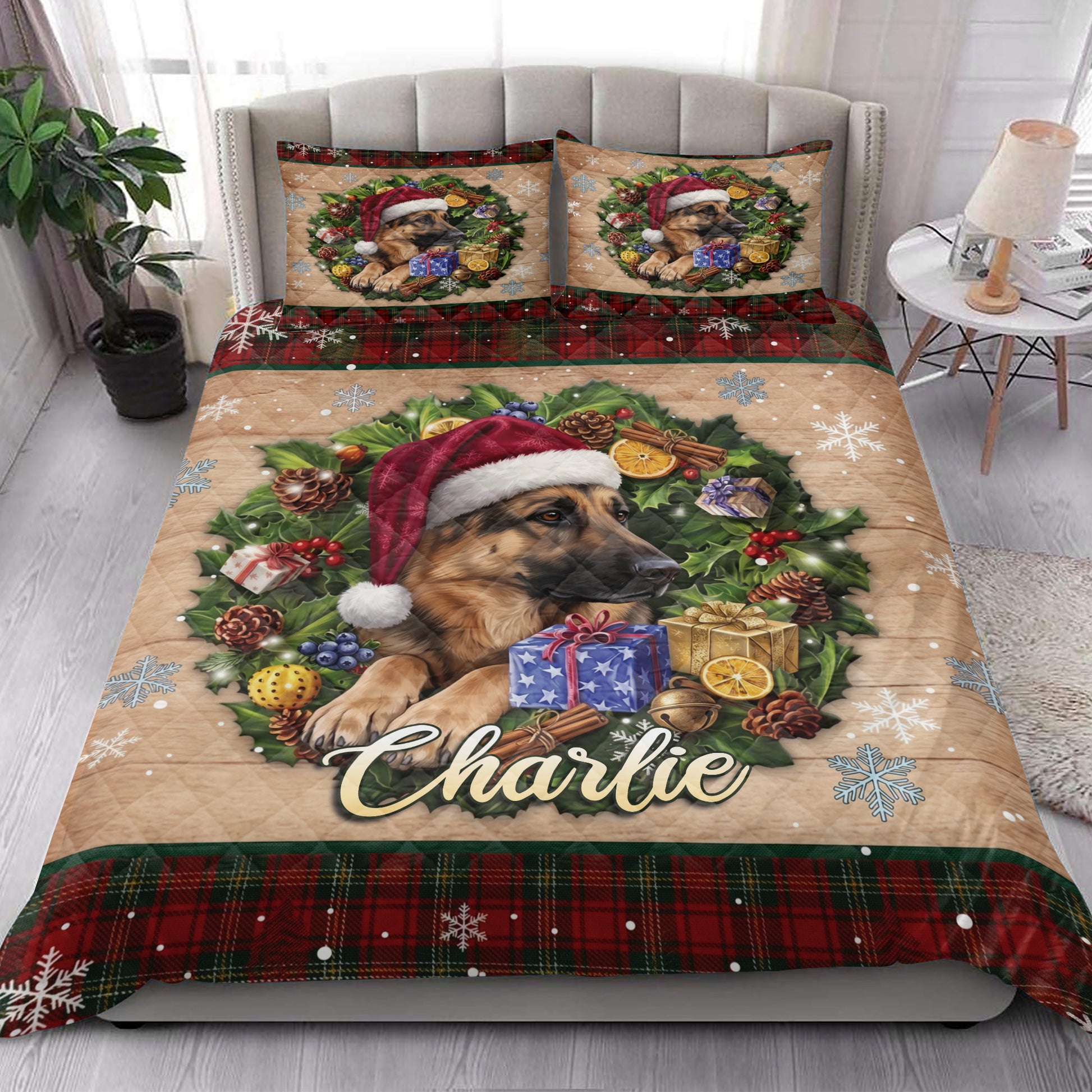 Christmas German Shepherd quilt bedding styled in a bright bedroom with festive wreath artwork and plaid trim