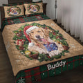 Golden Retriever Christmas quilt blanket displayed on a bed with plaid borders, gifts, wreath greenery, and snowflakes