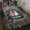Patriotic veteran quilt blanket displayed on a bed with camouflage, American flag dog tags, and military-inspired artwork
