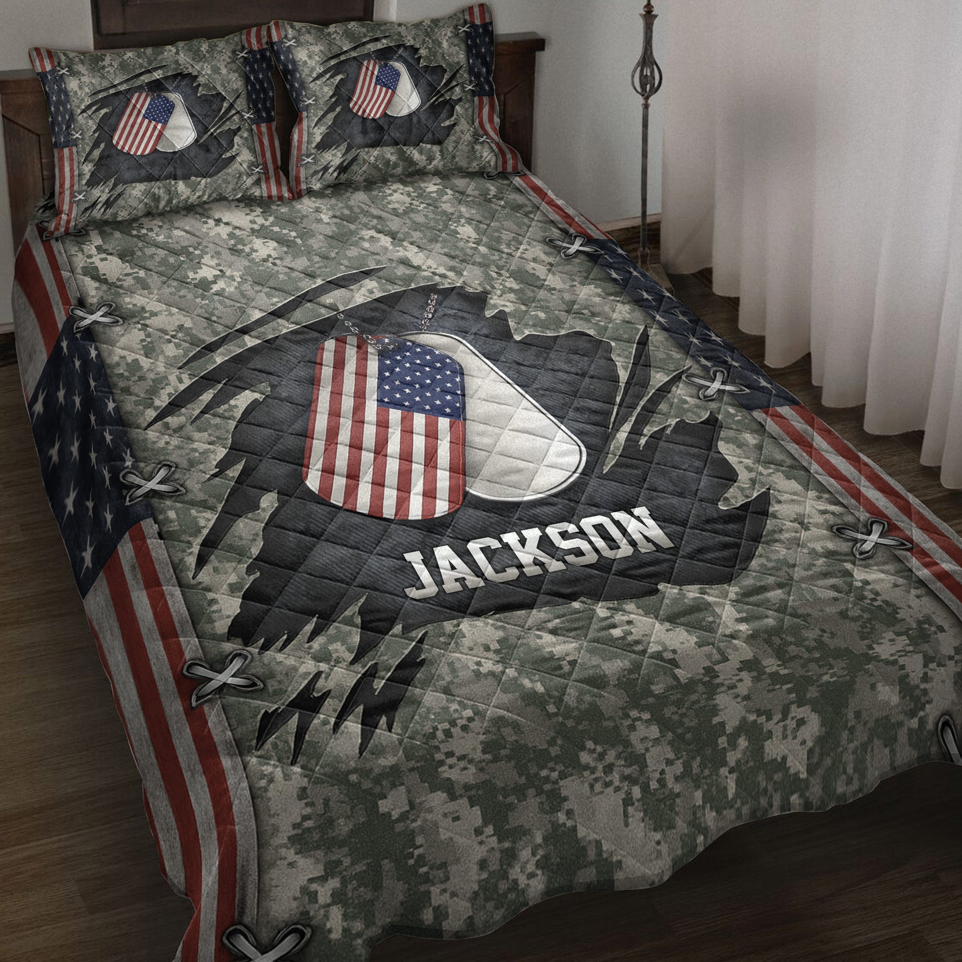 Patriotic veteran quilt blanket displayed on a bed with camouflage, American flag dog tags, and military-inspired artwork