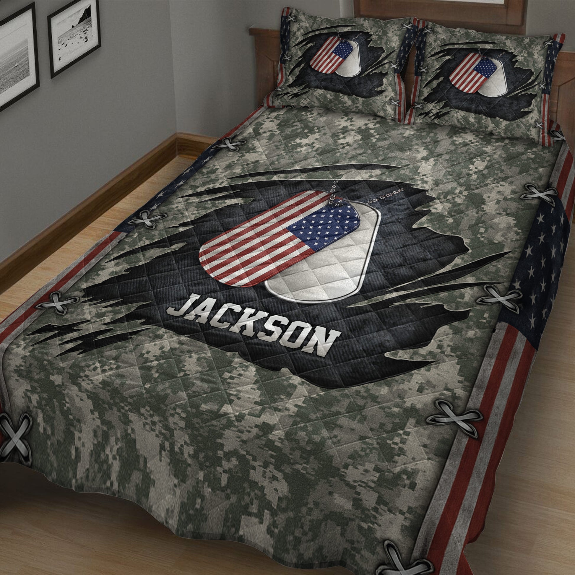 Close-up veteran bedding quilt featuring camouflage print, American flag dog tags, and bold military-inspired design