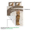 Bengal cat quilt detail showing the printed side, white backing, quilt stitching, and paw-print pattern