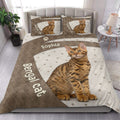 Bengal cat quilt blanket styled in a bright bedroom with a large spotted cat and paw-print design